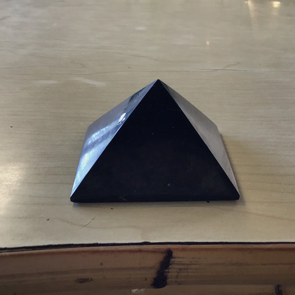 Black pyramid paper weight